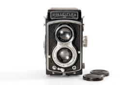 A ROLLEIFLEX 3.5F MEDIUM FORMAT CAMERA - black, serial no. 871053, with Carl Zeiss Jena, Tessar f/