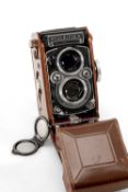 A ROLLEI F&H ROLLEIFLEX 3.5F MEDIUM FORMAT CAMERA - black, serial no. 2381837, with Carl Zeiss,