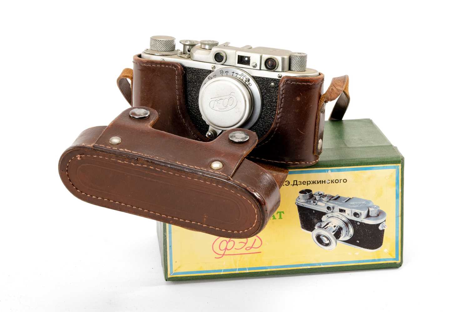 A SOVIET FED camera, f/50mm, serial no. 669794, in leather ERC, boxed