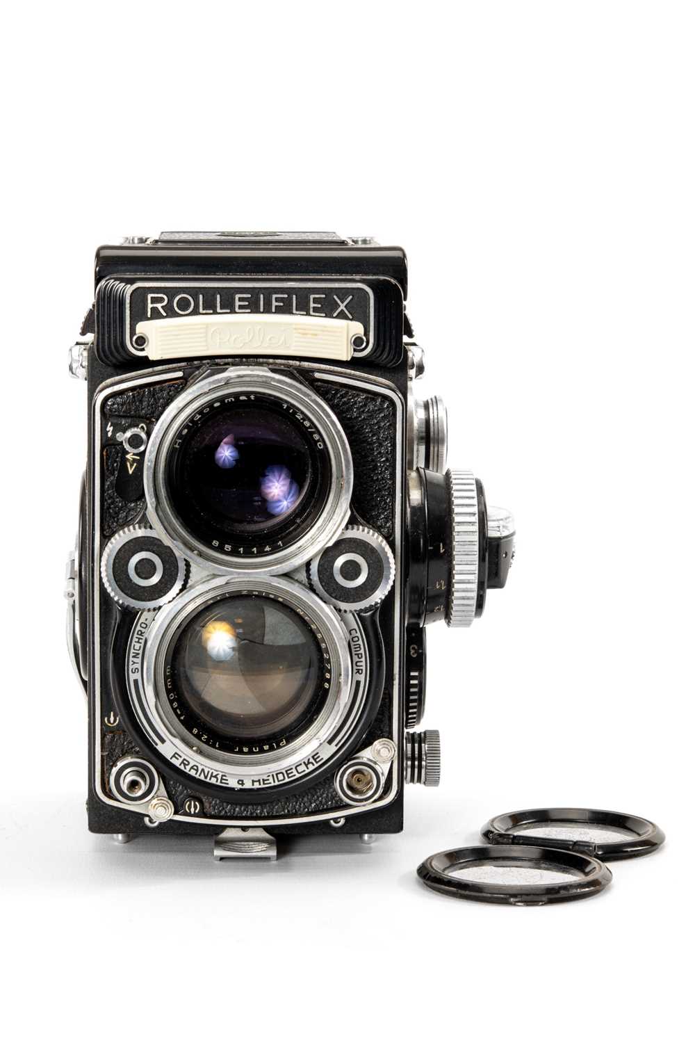 A ROLEI F&H ROLLEIFLEX 2.8F MEDIUM FORMAT CAMERA - black, serial no. 2400583, with a Carl Zeiss,