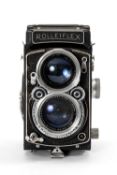 A ROLLEIFLEX 2.8F MEDIUM FORMAT CAMERA - black, serial no. 1220523, with a Carl Zeiss Jena,