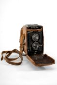 A ROLLEIFLEX 3.5F MEDIUM FORMAT CAMERA - black, serial number indecipherable, with Carl Zeiss