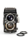 A ROLLEIFLEX 2.8F MEDIUM FORMAT CAMERA - black, serial no. 1260435, with a Schneider-Kreuznach,