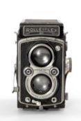 A ROLLEIFLEX 3.5F MEDIUM FORMAT CAMERA - black, serial no. 1058291, with Carl Zeiss Jena, Triotar