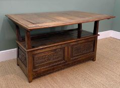 JOINED OAK TABLE SETTLE, folding top decorated to the underside with three panels of geometric