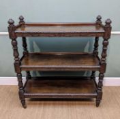 19TH CENTURY CARVED & STAINED OAK BUFFET, foliate carved uprights dividing three tiers, ceramic