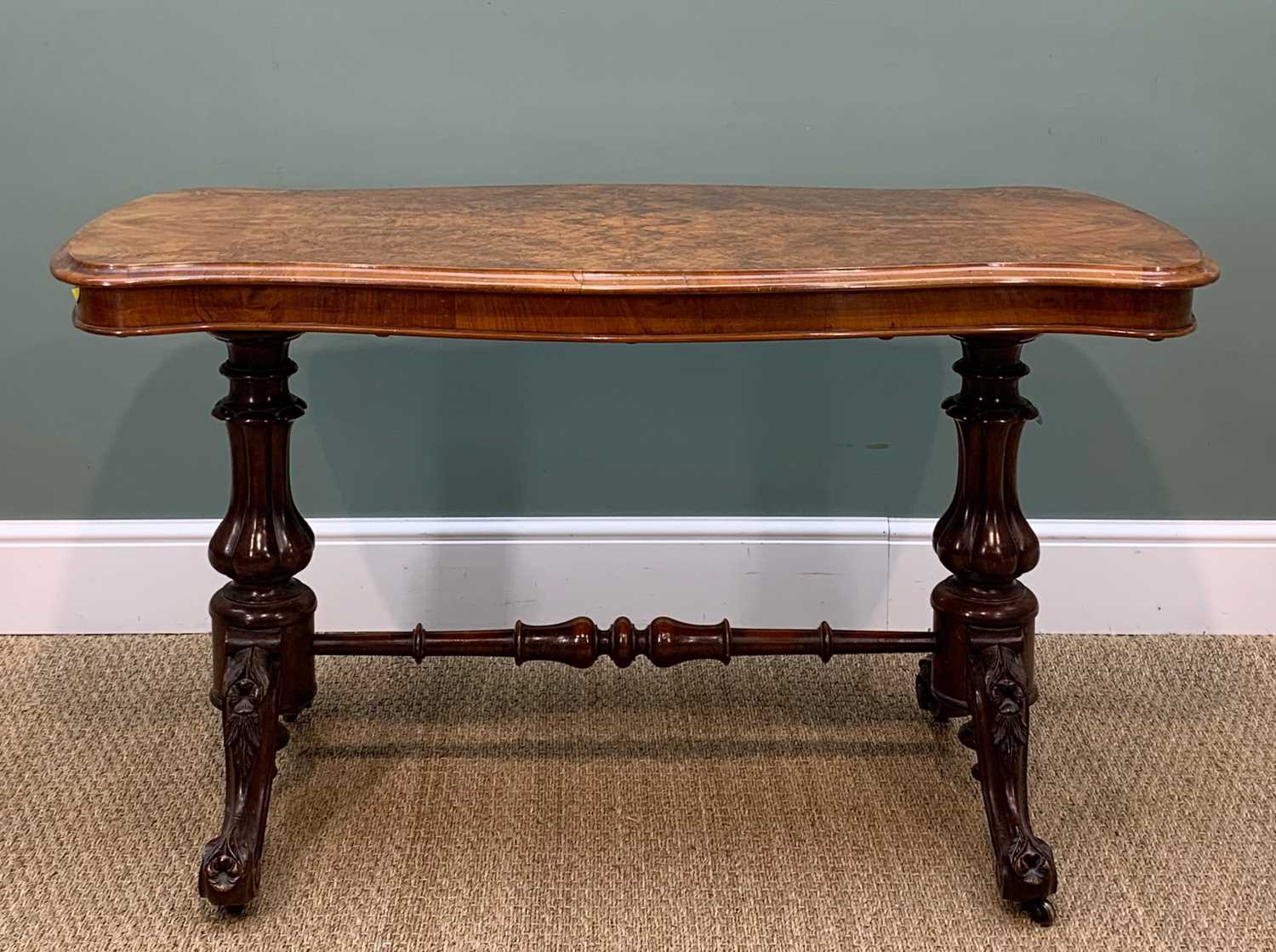 MID-VICTORIAN FIGURED WALNUT TRESTLE TABLE, shaped moulded top on lobed baluster supports and - Image 2 of 7