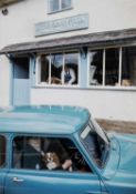 ‡ JOHN BULMER (British, b.1938) colour photographic print circa 1960s - lady and spaniel in car