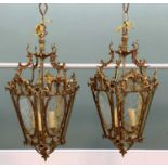 PAIR LOUIS XV-STYLE BRASS HALL LANTERNS, of tapering hexagonal form fitted with engraved clear glass