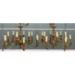 PAIR 19TH CENTURY FRENCH-STYLE BRASS 12-LIGHT CHANDELIERS, with six bifurcated foliate arms, with