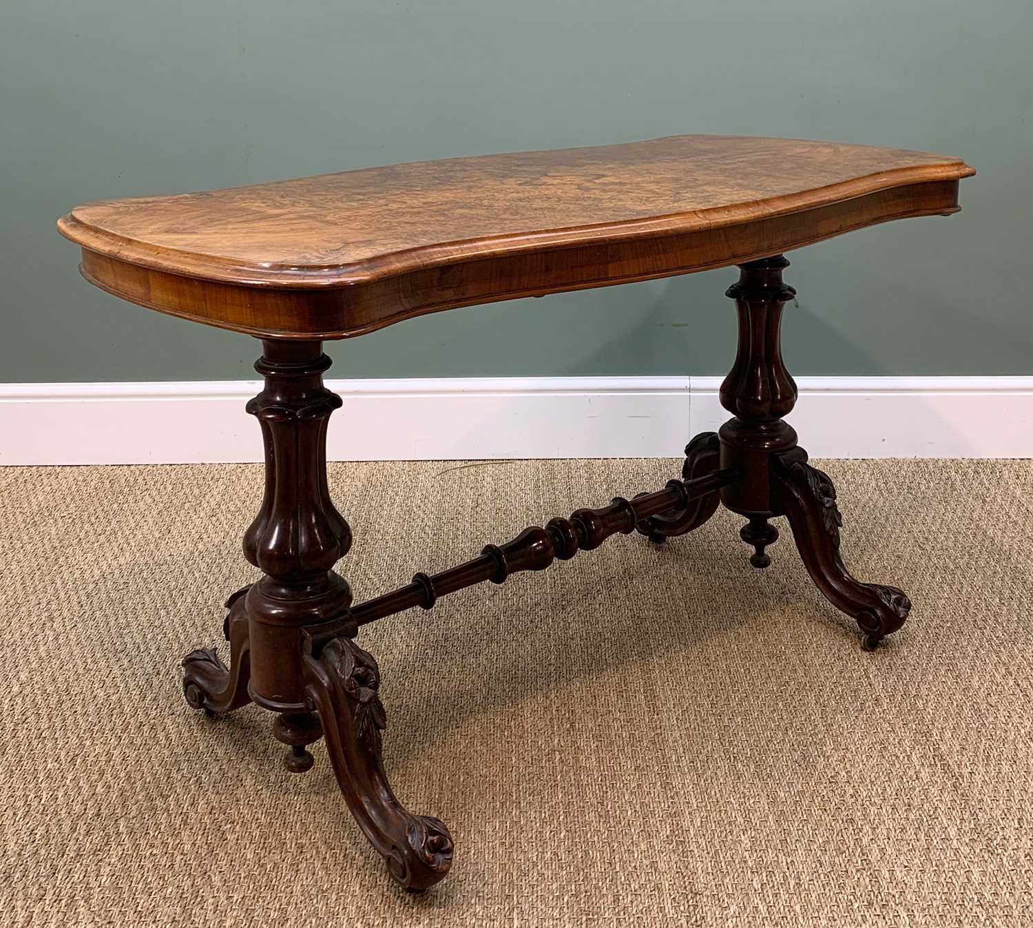 MID-VICTORIAN FIGURED WALNUT TRESTLE TABLE, shaped moulded top on lobed baluster supports and - Image 3 of 7