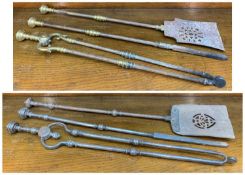 TWO SETS OF STEEL 19TH CENTURY FIRE IRONS, each comprising tongs, poker and shovel, one set with