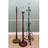 THREE STANDAND LAMPS, including an adjustable, black-painted, wrought iron lamp (3)