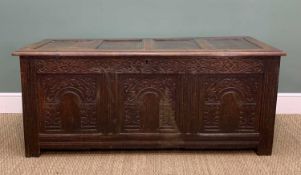 18TH CENTURY JOINED OAK COFFER, four panelled top above arch-carved triple panelled front, carved