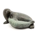 ‡ FELICITY AUDEN (20th Century) limited edition (32/50) patinated bronze - recumbent seal and pup,