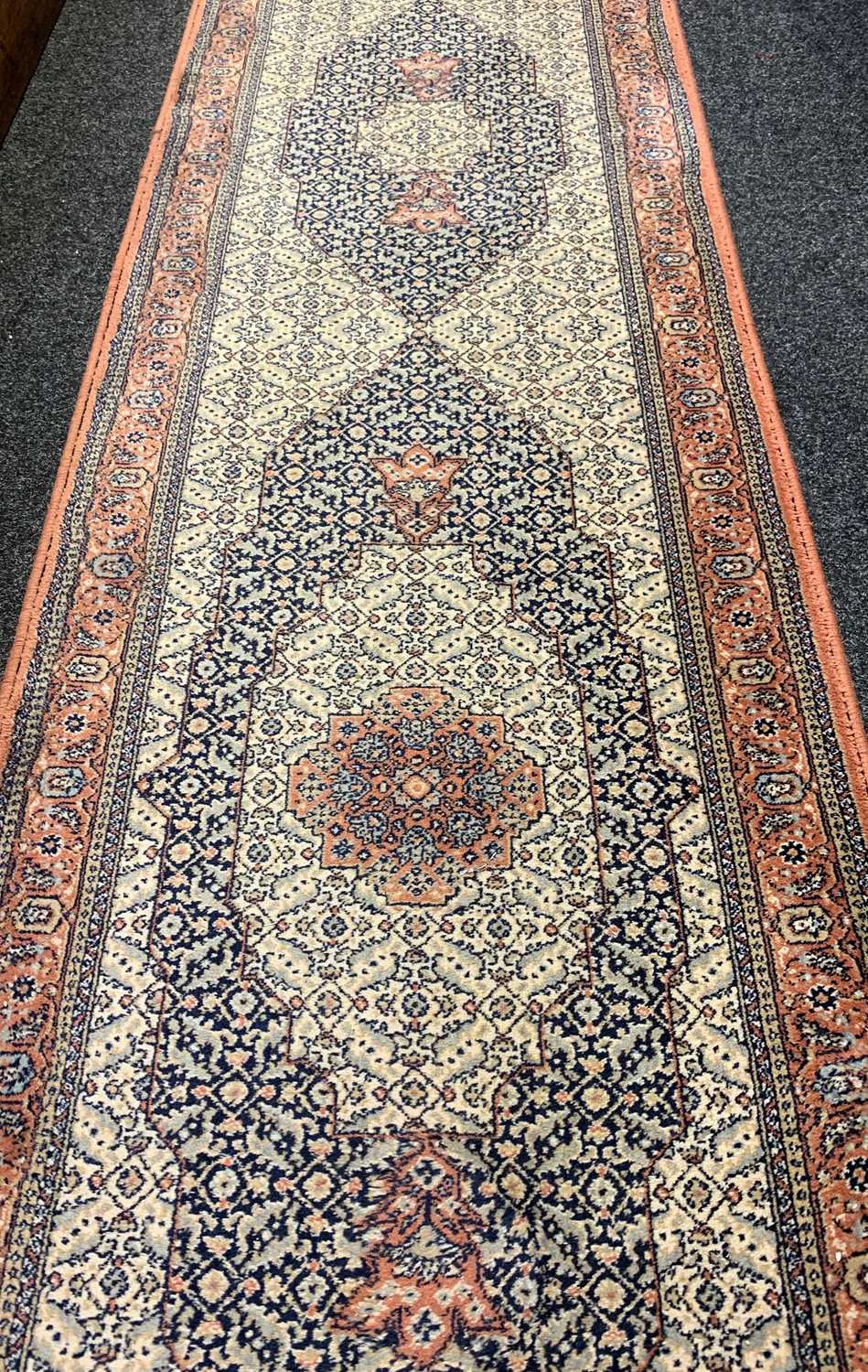 ORIENTAL RUNNER, blue and cream triple medallion field, narrow palmette meander border, retailer's - Image 2 of 3