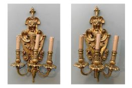 PAIR 19TH CENTURY FRENCH BRASS WALL LIGHTS, each cast with grotesque mask and supporting three