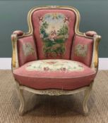 EARLY 20TH CENTURY NEEDLEWORK BERGERE, the white painted moulded frame with gilt highlights,