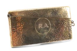 9CT GOLD CALLING CARD CASE, of slim curved form, beaten finish, engraved initials 'R. A.', 46.4gms