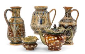 ASSORTED DOULTON CERAMICS comprising three Doulton Lambeth jugs with scroll and foliate incised
