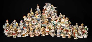 ASSORTED CONTINENTAL PORCELAIN CHILD FAIRINGS (approx. 100) Provenance: private collection Glamorgan