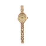 9CT GOLD LADY'S ROTARY WRISTWATCH, quartz, with oval dial, baton markers, and 9ct gold integrated
