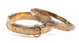 TWO 9CT GOLD HINGED BANGLES, one with buckle design and engraved, 24.5gms gross (2) Provenance: