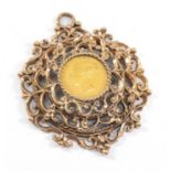 VICTORIAN GOLD HALF SOVEREIGN, 1866, young head, shield back, in 9ct gold stepped scroll pendant