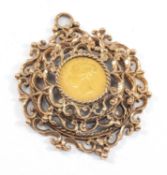 VICTORIAN GOLD HALF SOVEREIGN, 1866, young head, shield back, in 9ct gold stepped scroll pendant