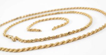 TWO 9KT GOLD SPIRAL LINK CHAINS, 34.4gms gross, in Herbert Brown & Youngs box Provenance: deceased