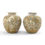 PAIR OF DOULTON LAMBETH STONEWARE VASES, designed by Bessie Newbery, having incised continuous
