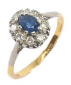 18CT SAPPHIRE & DIAMOND CLUSTER RING, oval cut sapphire 6 x 4mms, tot diamond wt appr. 0.4g, gross