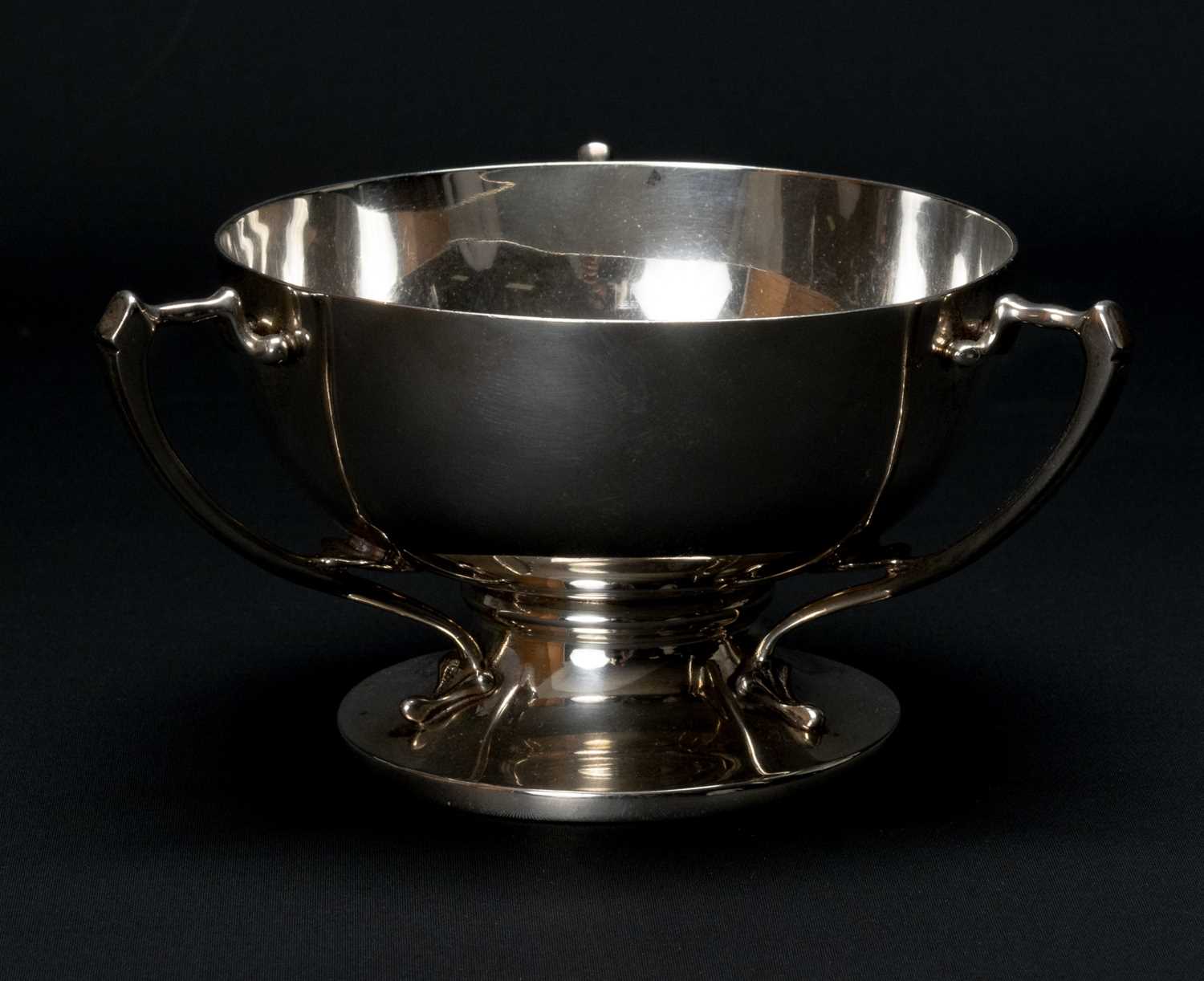 EDWARD VII SILVER TYG, Walker & Hall, Sheffield 1904, with three whiplash foliate handles, socle