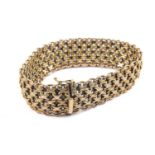 9CT GOLD ITALIAN BREV WIDE BRACELET, stamped 'BREV', 20.5cms long, 24.9gms Provenance: private