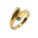 18CT GOLD TWO STONE BLUE DIAMOND RING, twist shank, ring size S, 9.3gms, in ring box Provenance: