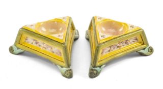 RARE PAIR OF DOULTON LAMBETH FAIENCE TRENCHER SALTS of triangular form, raised on scroll feet,