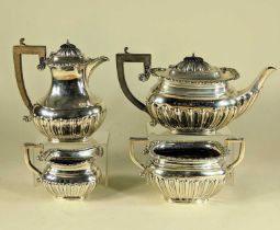 GEORGE V SILVER FOUR-PIECE TEA SERVICE, George Bowen & Sons, Birmingham 1911, half fluted oval