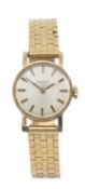 18CT GOLD TISSOT LADIES BRACELET WATCH, champagne dial with baton numerals, brick link bracelet with