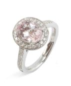 18CT WHITE GOLD MORGANITE & DIAMOND HALO RING with diamond set shoulders, ring size K, 5.0gms, in