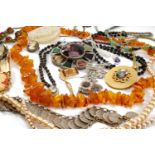 ASSORTED COSTUME & DRESS JEWELLERY comprising various necklaces, brooches, amber beads, cameo