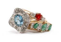 THREE 9CT GOLD GEM SET RINGS including topaz, emeralds and diamonds, 8.3gms gross (3) Provenance: