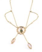 YELLOW METAL MULTI-GEM PENDANT CHAIN, set with seed pearls, diamond, green and pink semi-precious