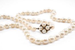 SINGLE STRAND CULTURED PEARL NECKLACE, with ruby chip set 9ct gold clasp, pearls 6/7mm diam,