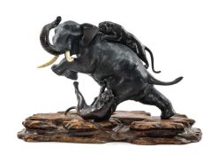 GOOD JAPANESE PATINATED BRONZE ELEPHANT & TIGER GROUP, Meiji Period, by Tsunemitsu, modelled with