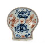 CHINESE IMARI SHELL DISH, Kangxi, painted and enamelled with flower sprays, underside ribbed and