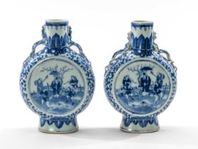 PAIR CHINESE BLUE & WHITE MOON FLASKS, painted with scholars and attendant on a terraced garden,