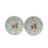 PAIR CHINESE FAMILLE ROSE SAUCER DISHES, Qianlong, of lobed form, centre painted with basket and