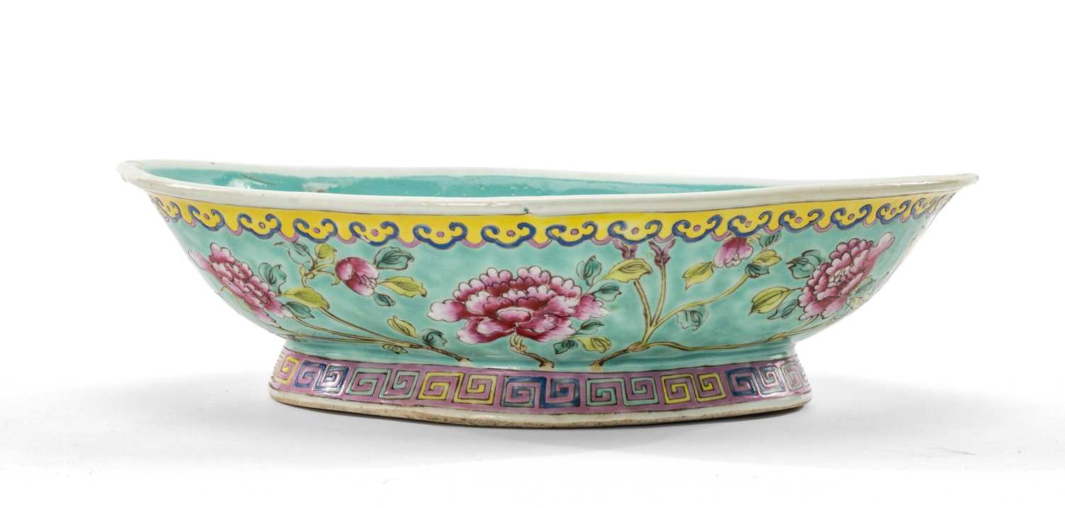CHINESE FAMILLE ROSE OFFERING DISH, 20th Century, of shaped lozenge form, outside painted with peony