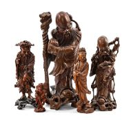 GROUP OF CHINESE CARVED BOXWOOD FIGURES OF IMMORTALS, 20th Century, including Shoulao, Guanyin and
