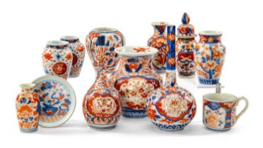 ASSORTED SMALL JAPANESE IMARI JARS, one with cover, together with 2 bottle vases, a teacup and a